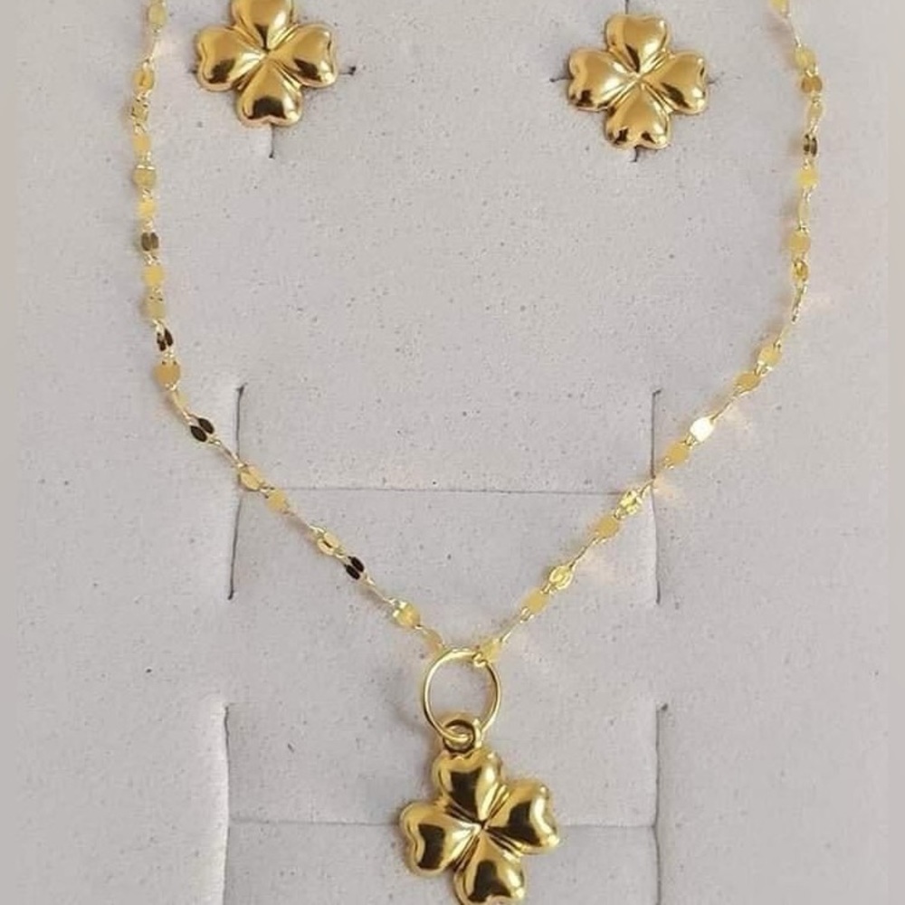 18karat Real Gold set (earrings and Nexklace ) 18" long .